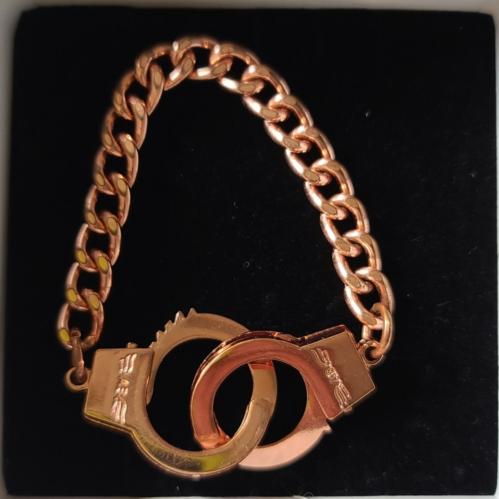 Rose tone handcuff bracelet